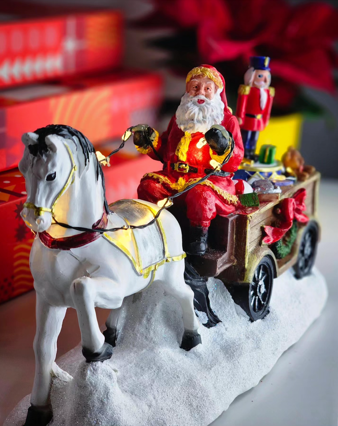 Santa with white horse, wagon and rotation nutcracker