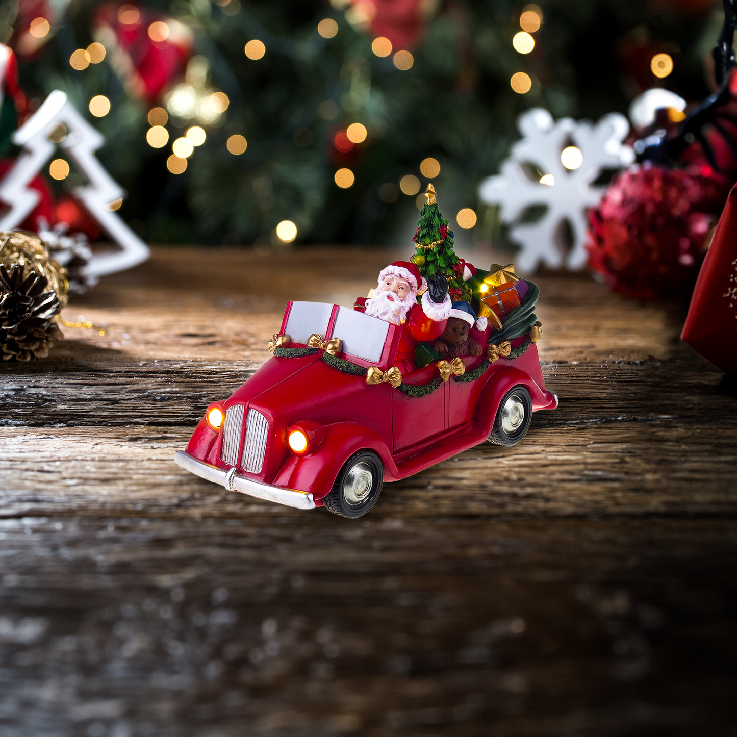 Santa in car with turning tree